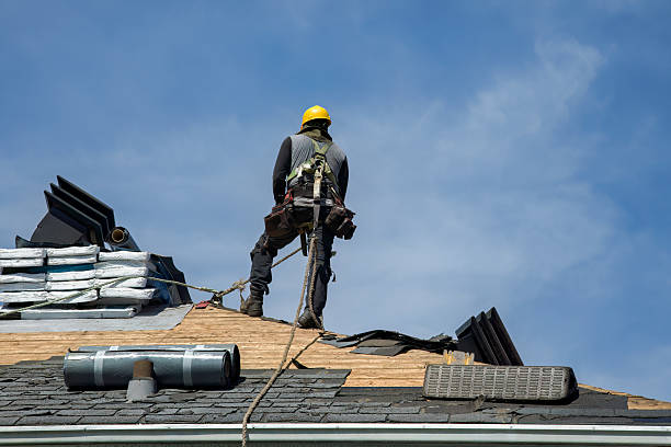 Professional Gutter Installation technician working in Wellsburg, IA